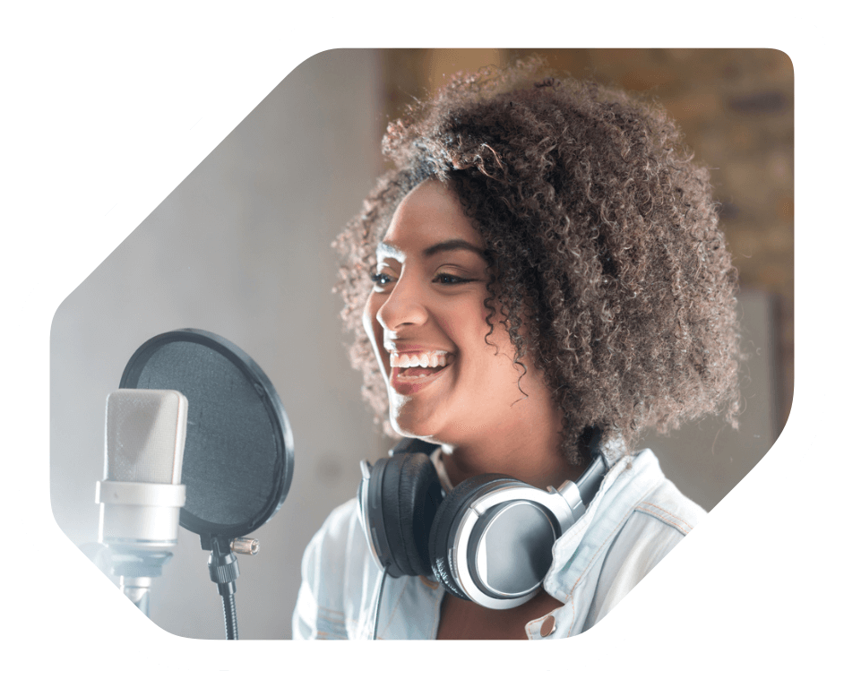 a female voice artist recording a voiceover